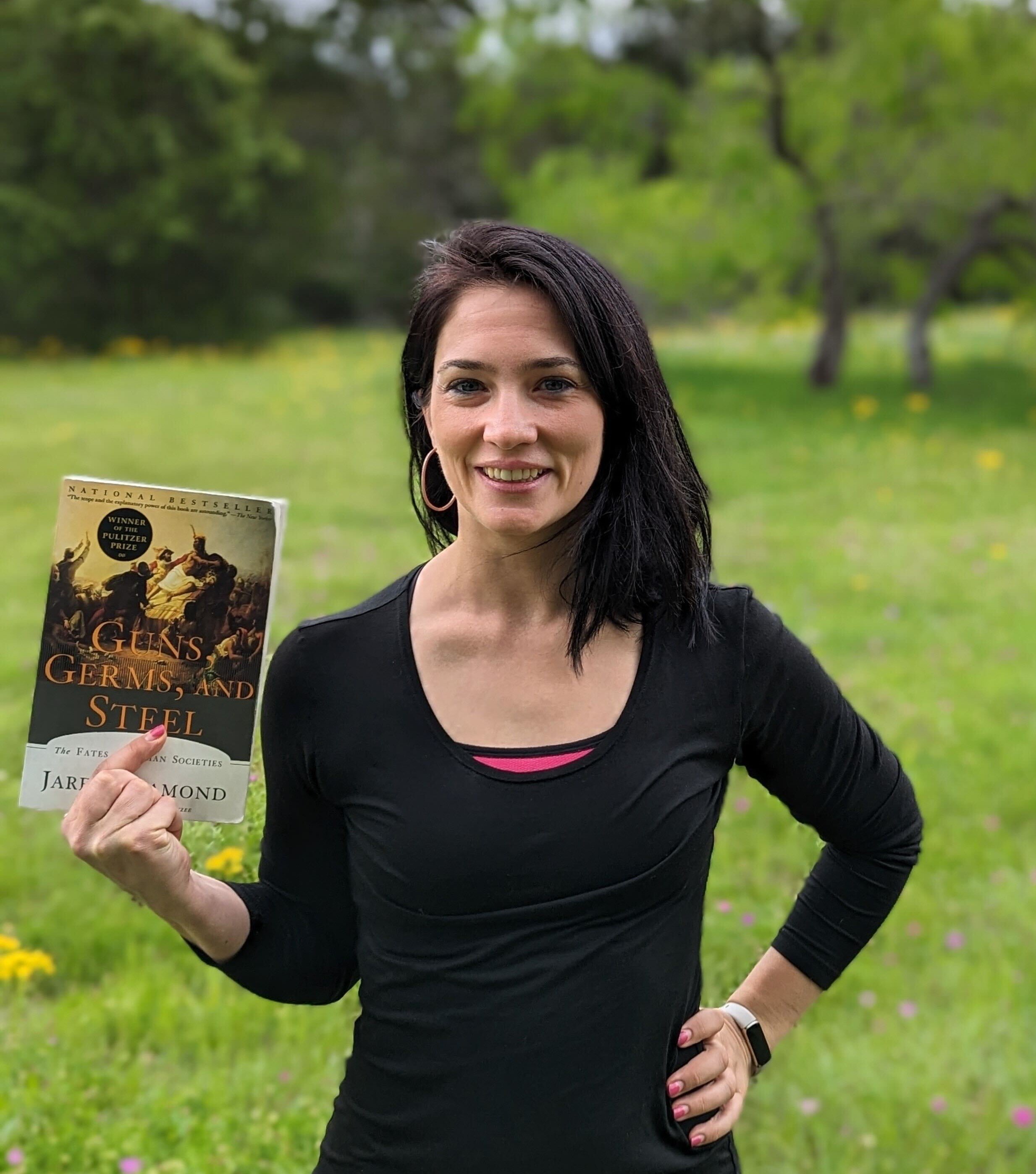 a photo of Cecile Arsan holding a book