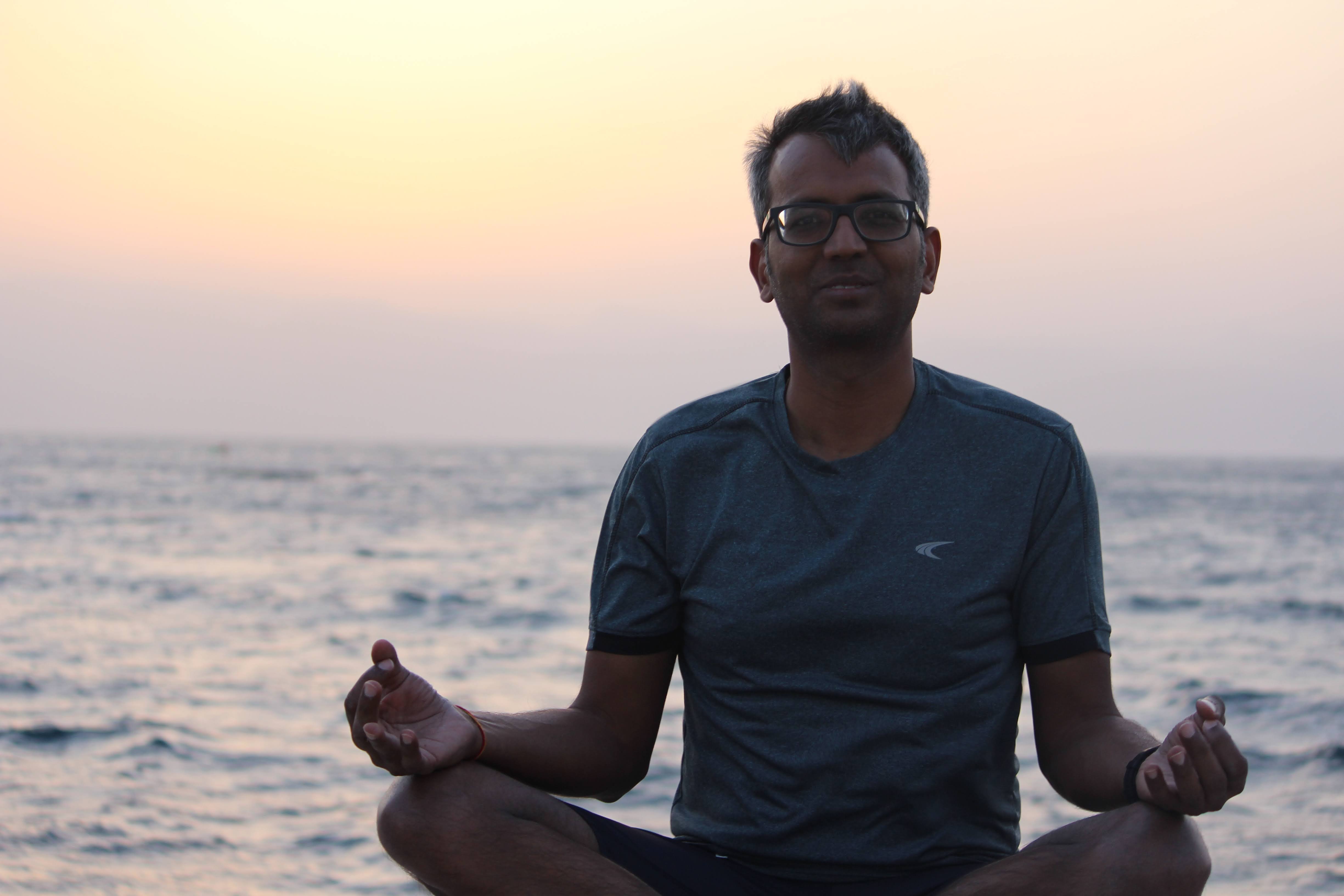 A portrait photo of Gautam Goenka, on the seaside