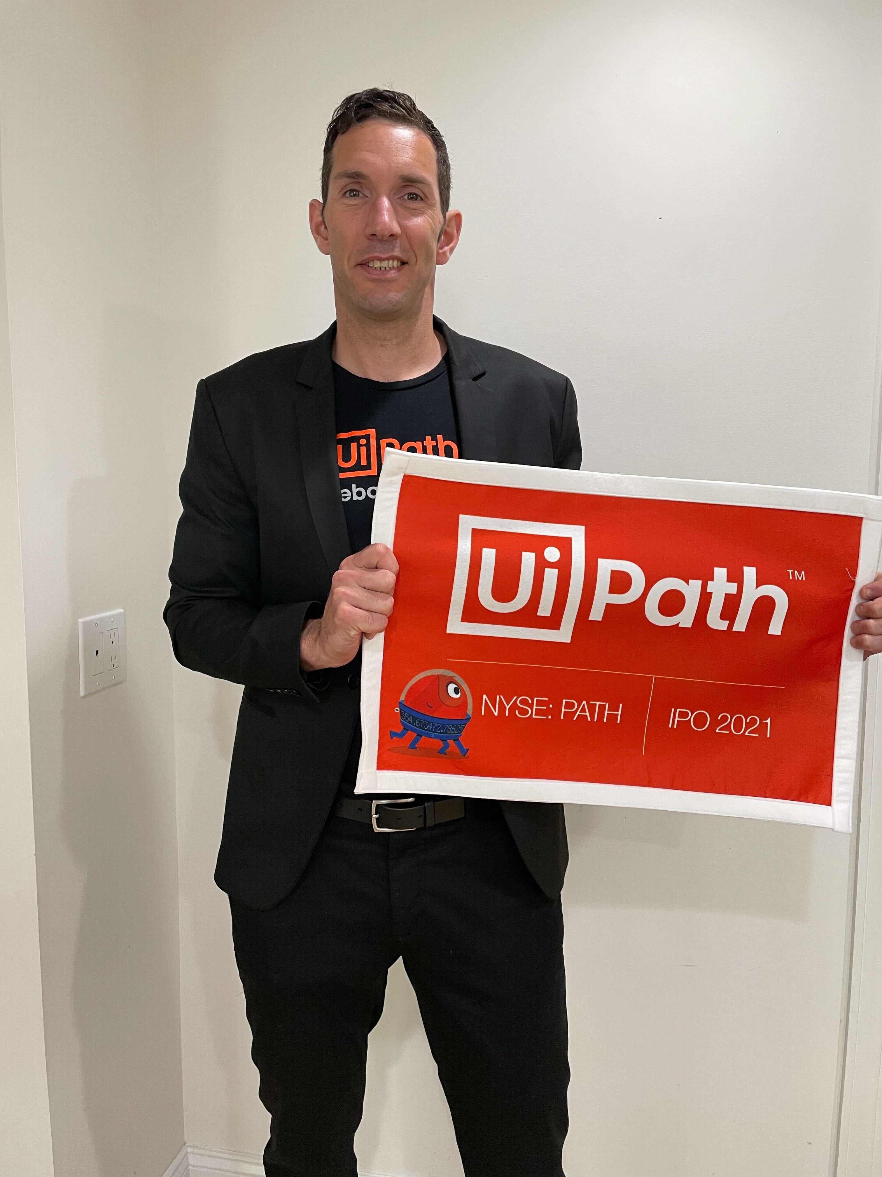 Lior Eldad holding a UiPath picture