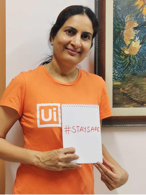 a woman wearing a UiPath t-shirt