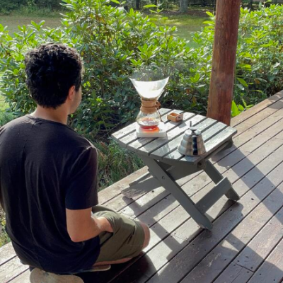 a photo of Josue Guevara making coffee