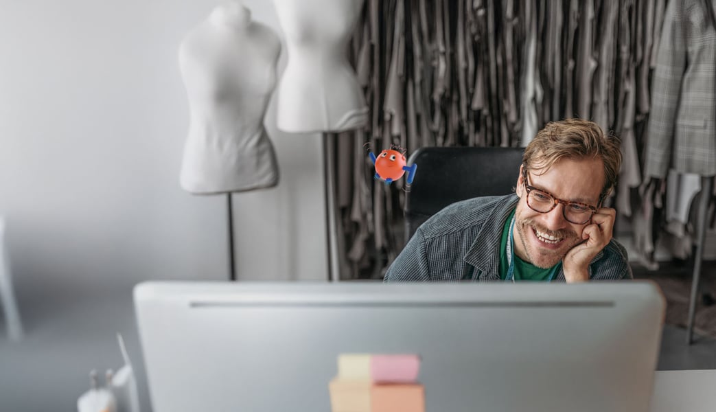 man smiling speaking on a phone