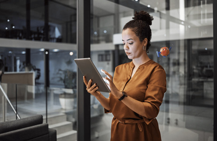 woman standing with a tablet device