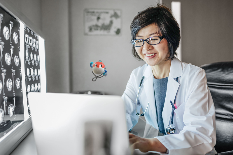 female in lab at computer