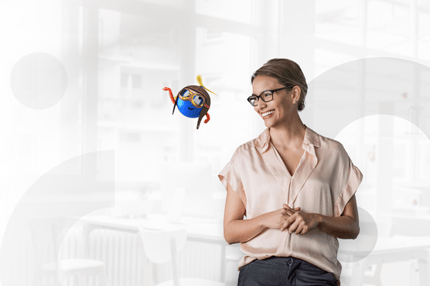 woman standing smiling with robot