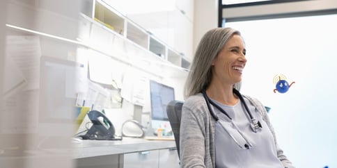 female wearing stethoscope medical office uipath healthcare robot assistant