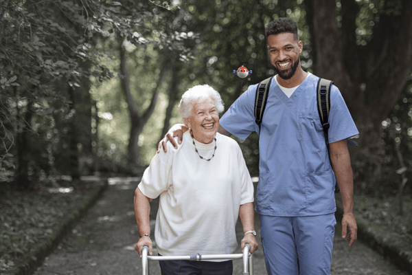 two people walking outdoors