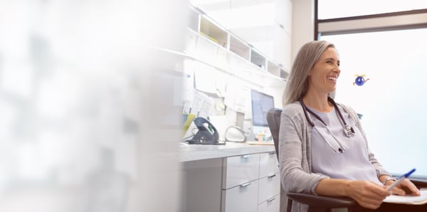 Happy healthcare provider is supported by UiPath Business Automation Platform.