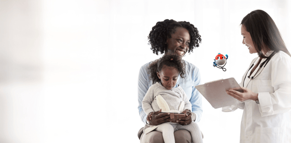 mother and daughter with doctor