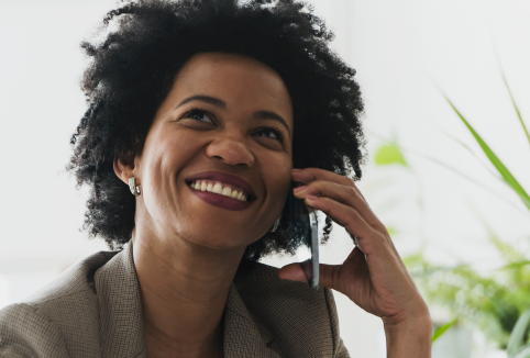 smiling woman on phone