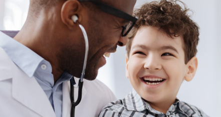 man and child laughing