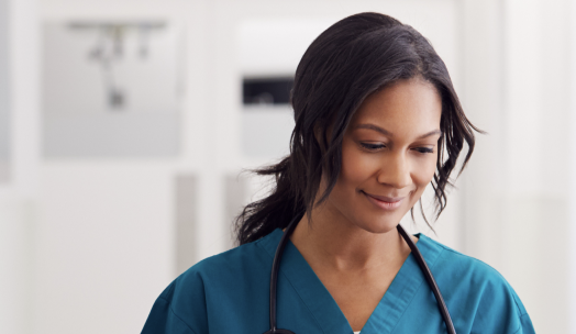 medical professional using a computer tablet